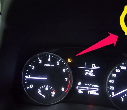 Что означает восклицательный знак на передней панели машины