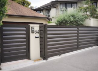 Какие ворота выбрать для частного дома?